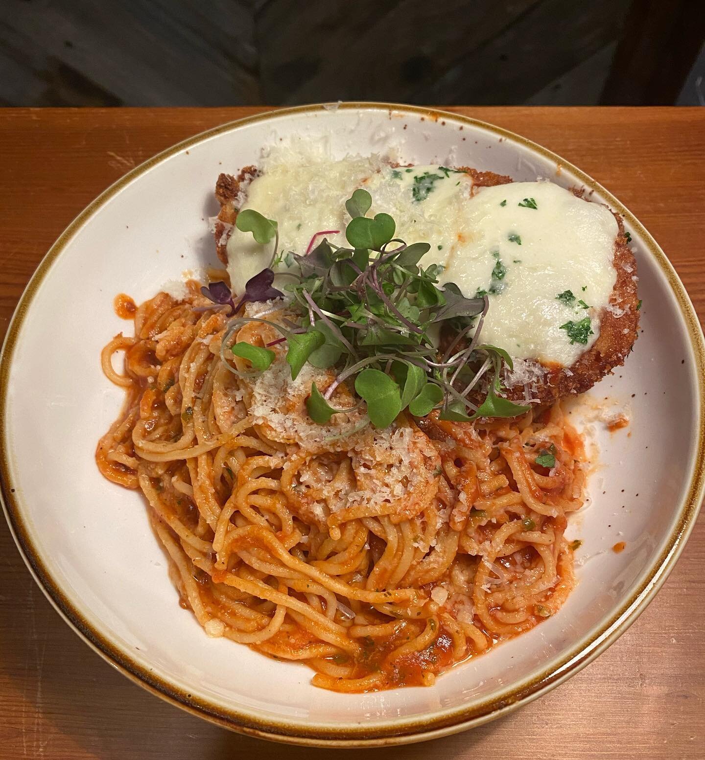 The cut of the day! Chicken Parmesan with spaghetti and tomato sauce!