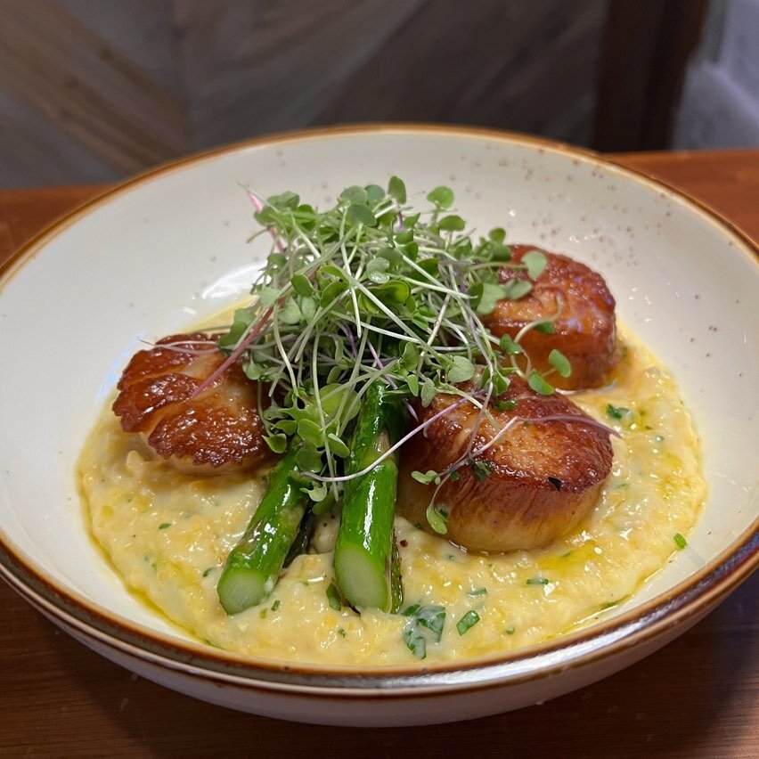 Our Catch special is pan seared scallops over grits with asparagus!